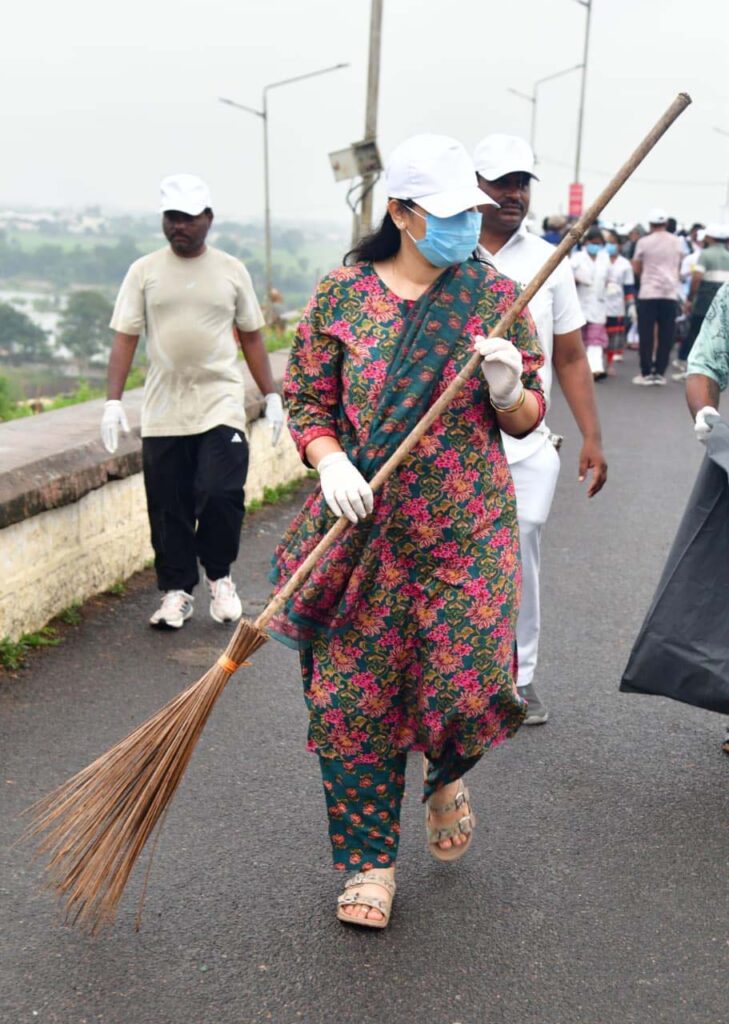 Karimnagar Collector Pamela Satpathi holding a broom